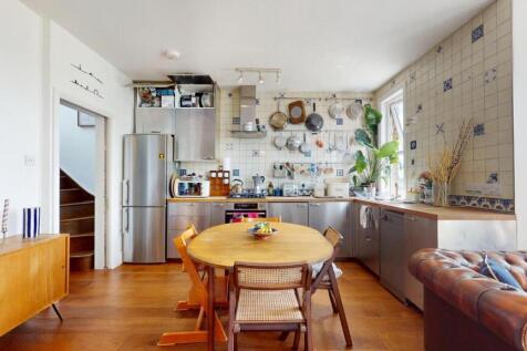Bright and inviting kitchen with modern applian...