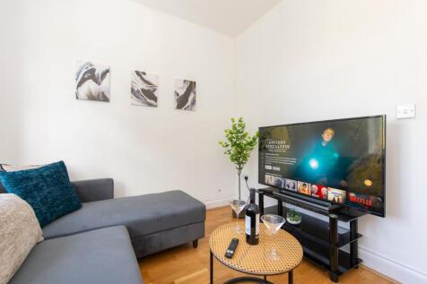 A stylish and inviting large modern living room...