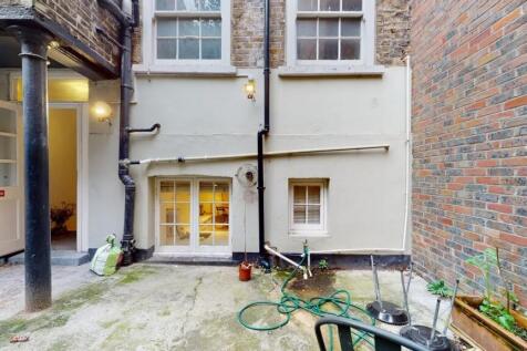View of the rear side of a terraced property sh...