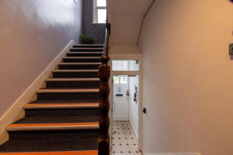 A clean and well-maintained staircase leading t...