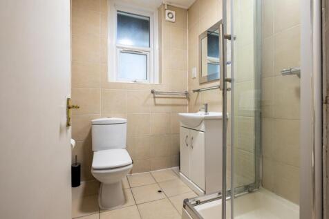 A tidy and well-maintained bathroom featuring m...