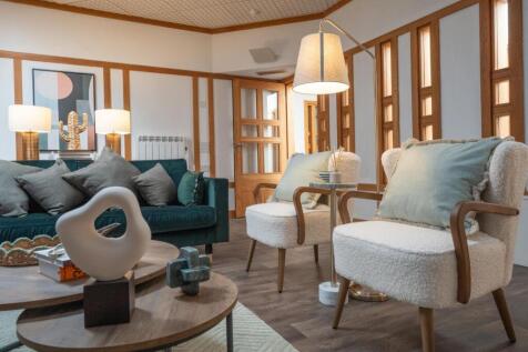 A stylish and inviting living room featuring a ...