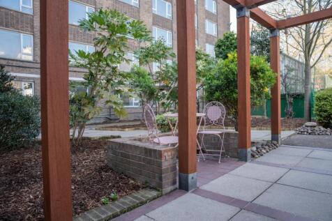 A beautifully maintained garden area featuring ...