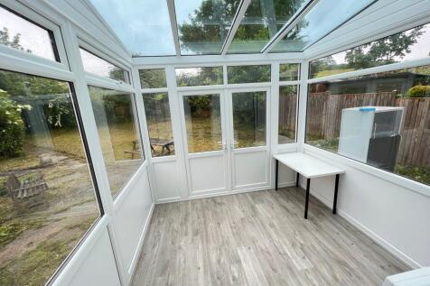 Bright and airy conservatory-style living space...