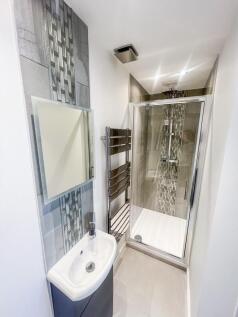 A modern and well-maintained bathroom featuring...