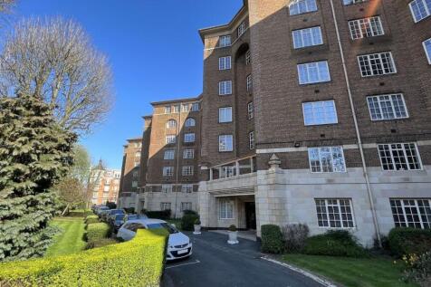 Well-maintained and attractive front of a large...