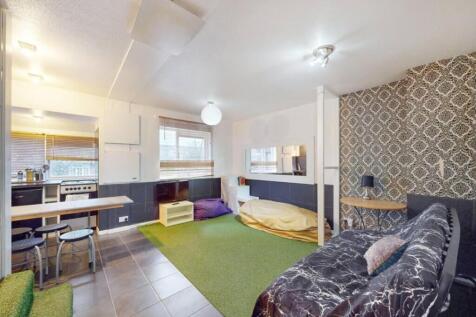 A spacious and stylish living room, perfect for...