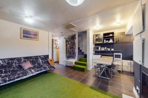 A stylish and inviting living room with modern ...