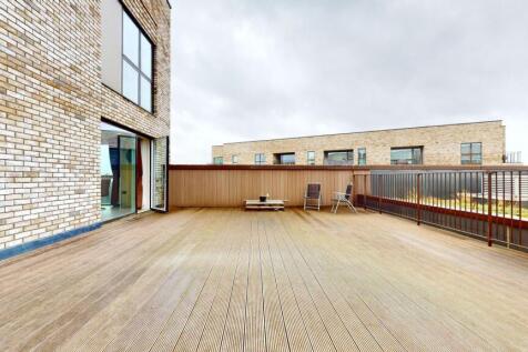 Spacious and well-maintained wooden deck area a...