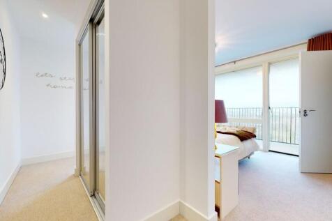 Bright and airy double bedroom featuring a larg...