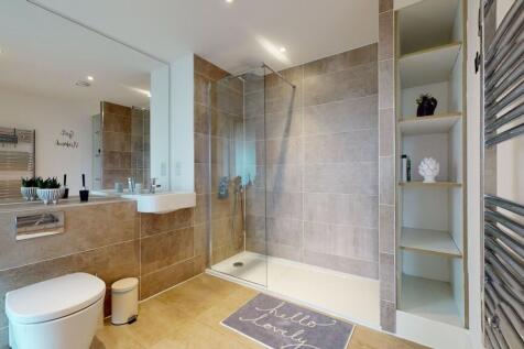 A modern and well-maintained bathroom featuring...