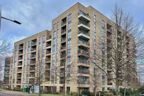 Modern multi-storey apartment building with bal...