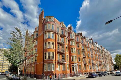 A stunning view of a classic red-brick terraced...