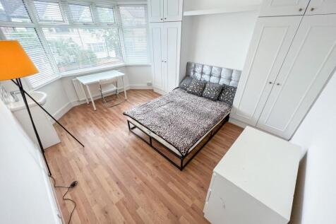 Bright and inviting double bedroom featuring a ...