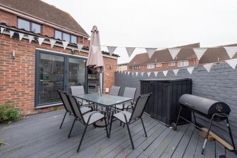 A modern and well-maintained outdoor patio area...