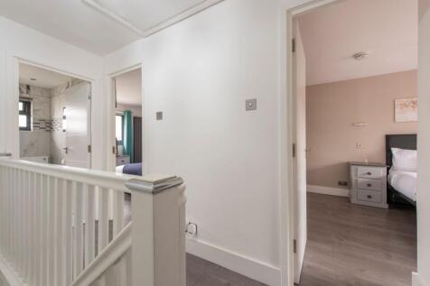 Bright and clean hallway with fresh white walls...