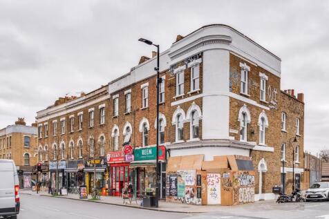 A charming terraced street corner featuring cla...
