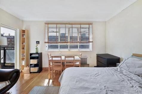 Bright and inviting double bedroom featuring a ...