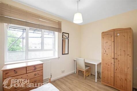 Bright and tidy student room featuring a large ...