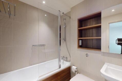 A modern and well-maintained bathroom featuring...