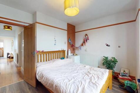Bright and inviting double bedroom featuring a ...