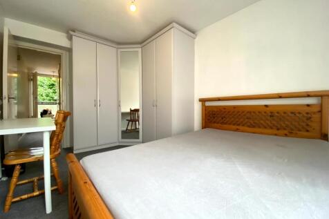 Bright and tidy double bedroom featuring a stur...