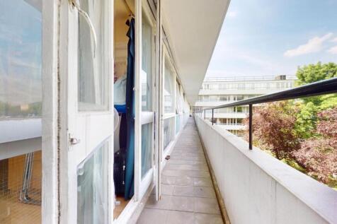 Bright exterior corridor of a residential prope...