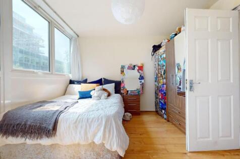 Bright and inviting double bedroom featuring a ...