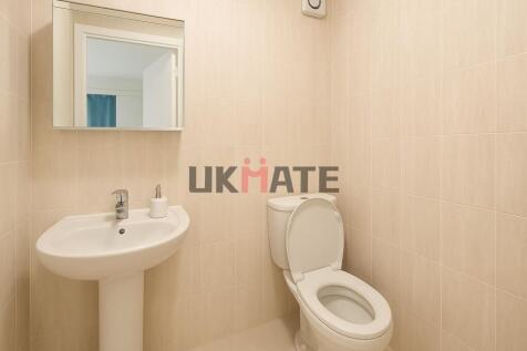 Bright and clean bathroom featuring a modern to...