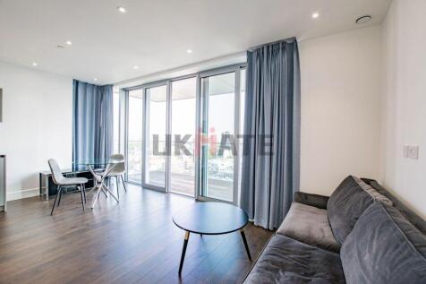 Bright and modern living room with large window...