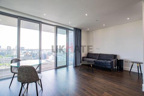 Bright and spacious living area featuring large...