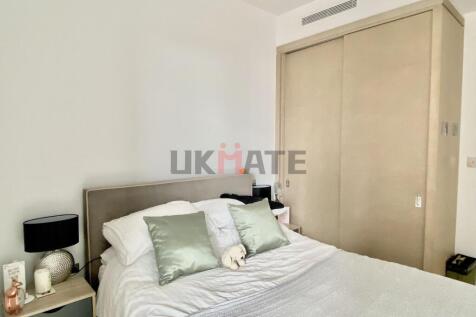 Bright and well-maintained bedroom featuring a ...
