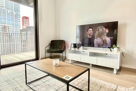 Modern living room with large window providing ...