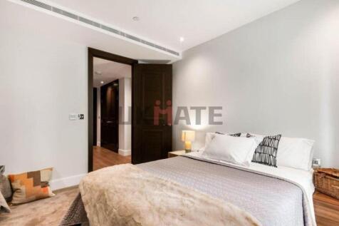 A bright and inviting double bedroom featuring ...