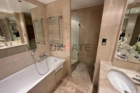 Modern and well-maintained bathroom with a spac...