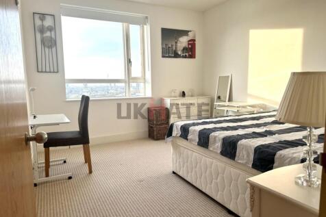 Bright and well-maintained bedroom featuring a ...