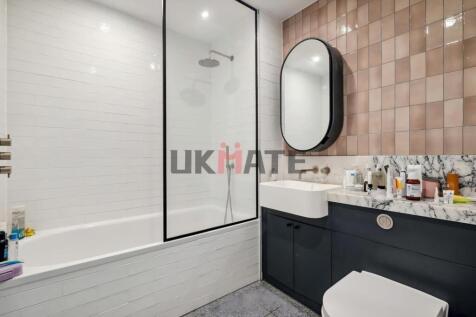 Modern bathroom with a spacious shower area, la...