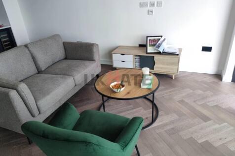 Modern and bright living room featuring a comfo...