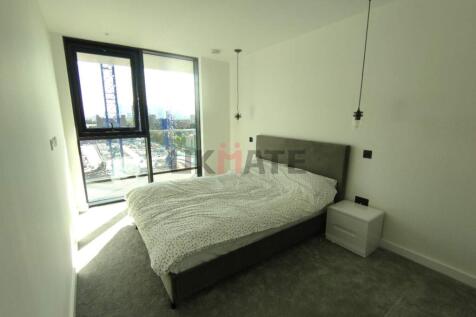 Bright and modern double bedroom featuring a sp...