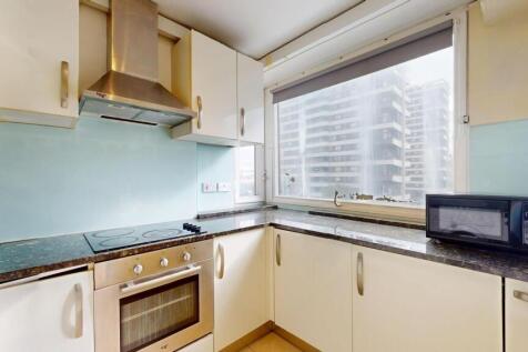 A bright kitchen with ample natural light from ...