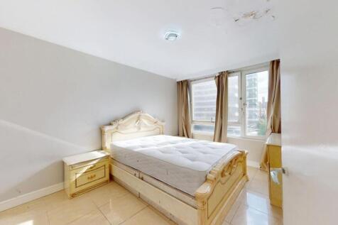 Bright and spacious double bedroom featuring a ...