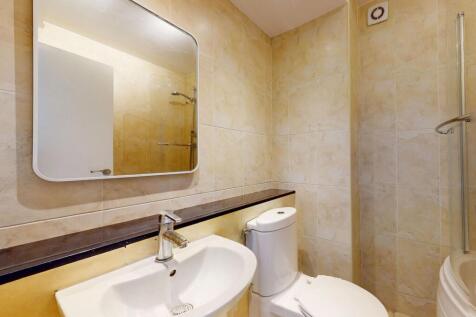 Modern bathroom featuring a clean sink with a l...