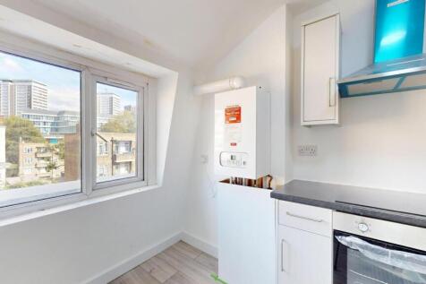 Bright and well-maintained kitchen with a large...