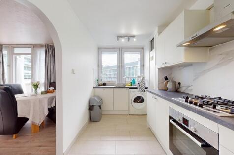 Modern and bright kitchen with ample natural li...