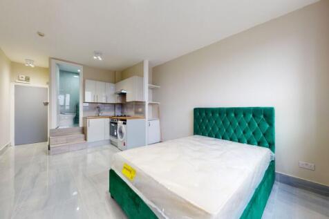 Bright and modern living space featuring a plus...