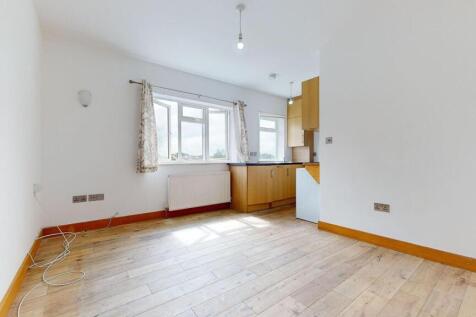 Bright and airy kitchen with large windows allo...