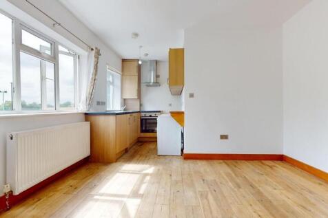 Bright and spacious kitchen with large windows,...