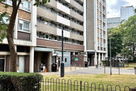 Modern mid-rise residential block with covered ...
