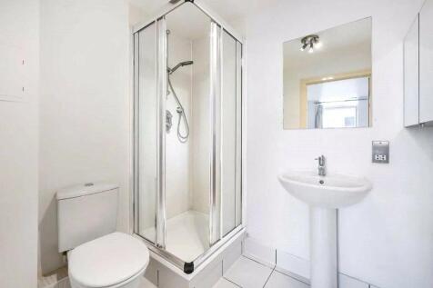 Bright and clean bathroom featuring a modern co...