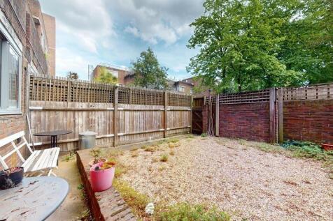 Private low-maintenance rear garden with gravel...